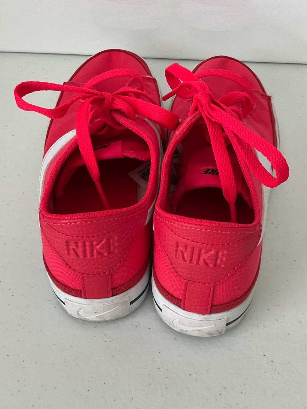 Nike Women's Hot Pink Canvas Low-Top Sneakers with White Swoosh - Picture 4 of 5